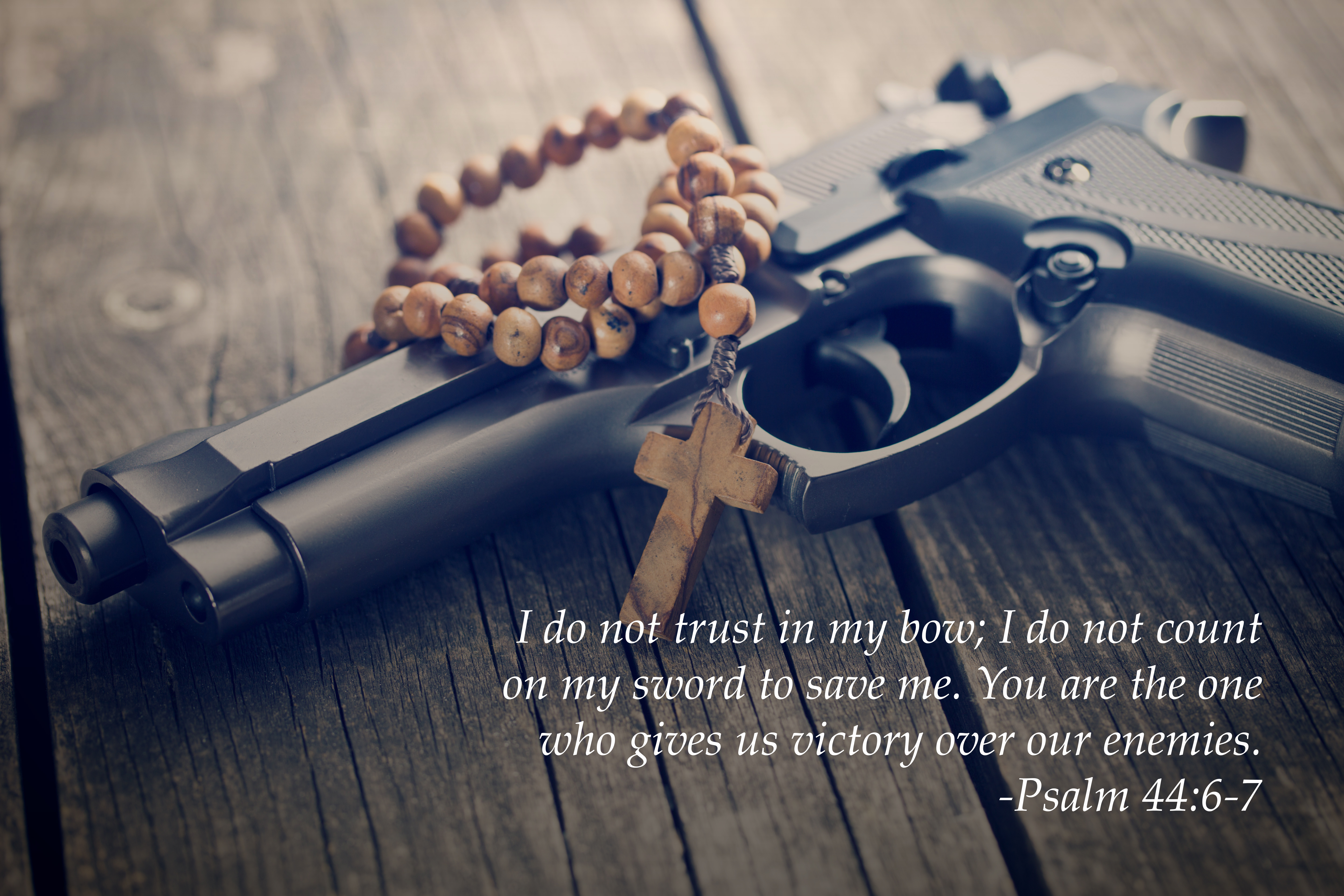 the rosary beads and gun